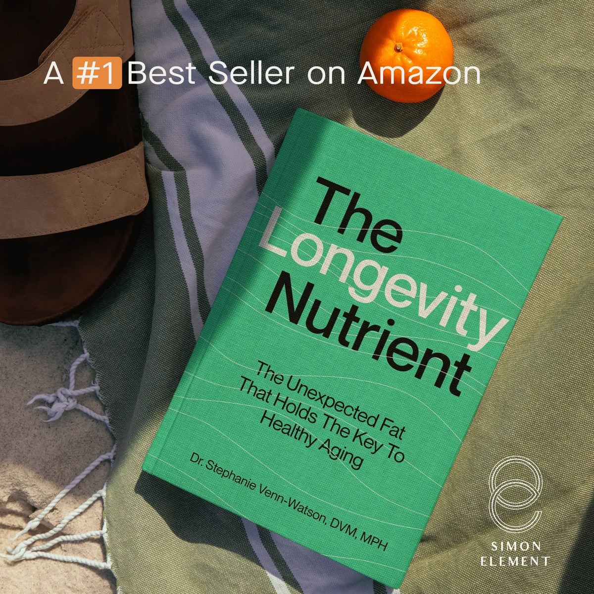 
                Book &#39;The Longevity Nutrient&#39; labeled Best Seller on Amazon beside sandals and orange.